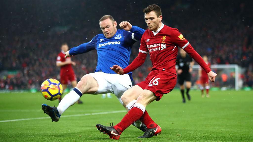 Wayne Rooney in action for Everton against Liverpool's Andy Robertson