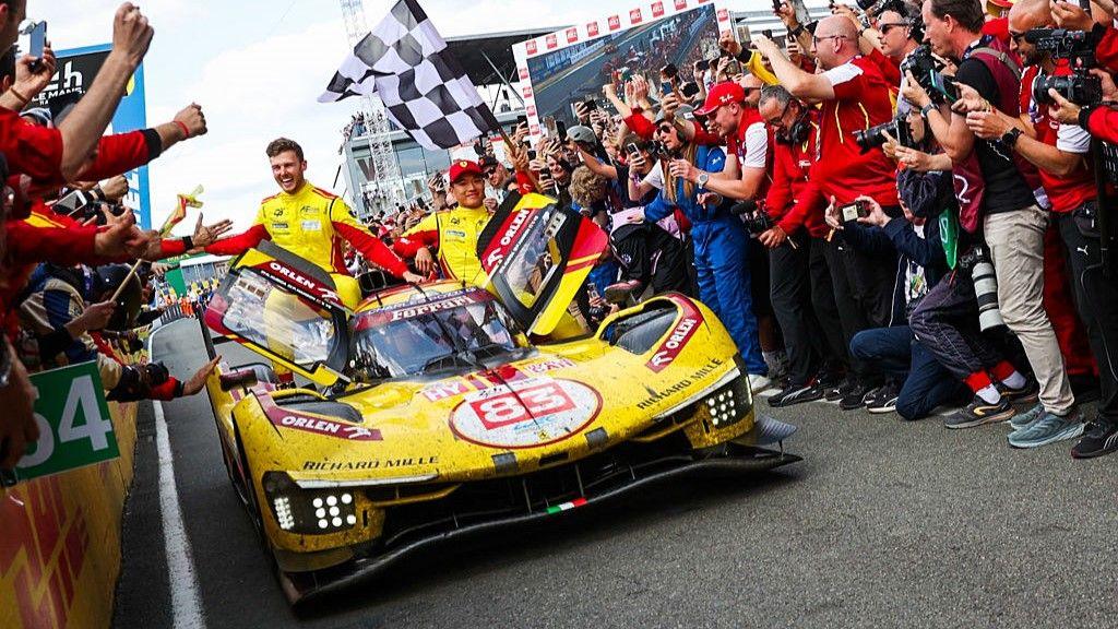 Phil Hanson, Robert Kubica and Ye Yifei celebrate winning Le Mans