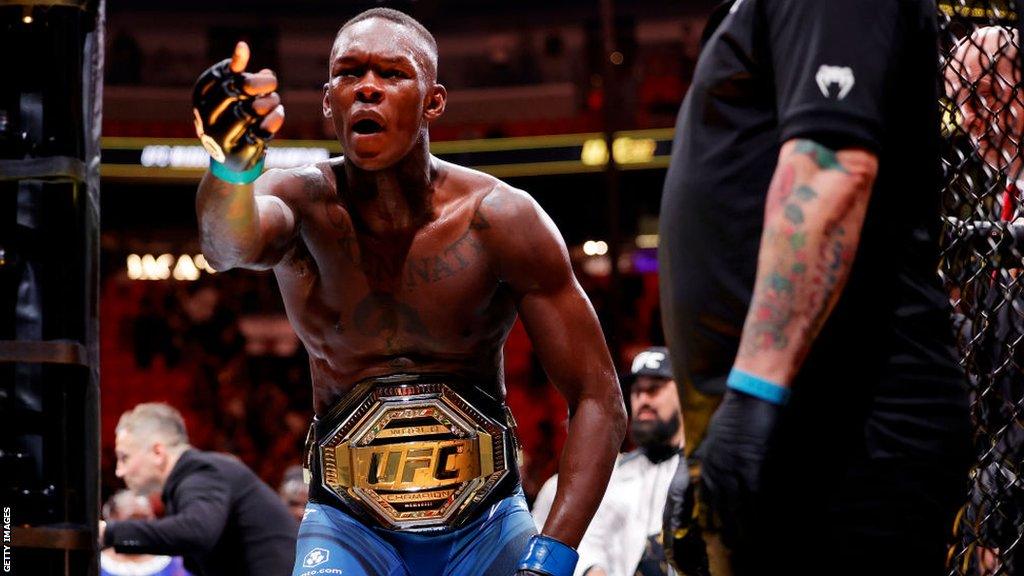 Israel Adesayna celebrates while leaving the octagon following his knockout of Alex Pereira in April.