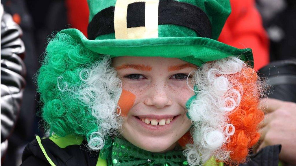 boy in leprechaun hat