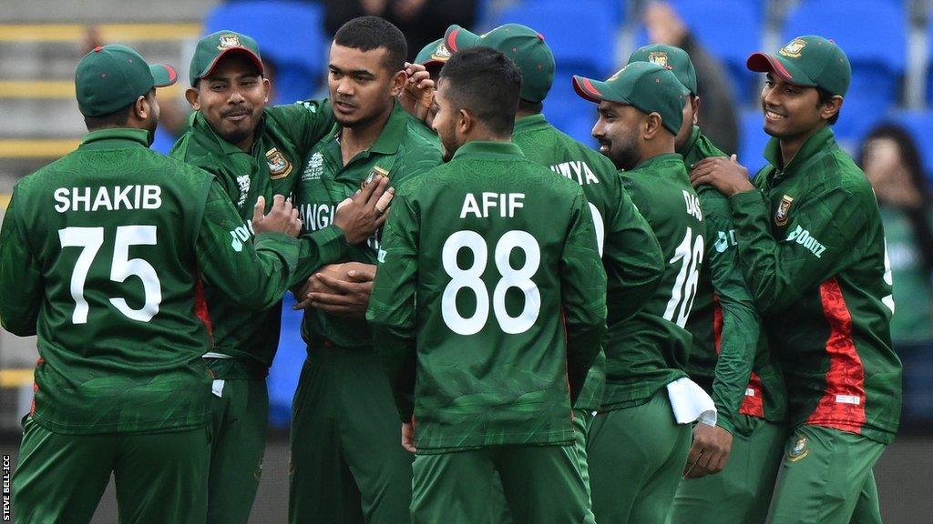 Bangladesh players celebrate a wicket