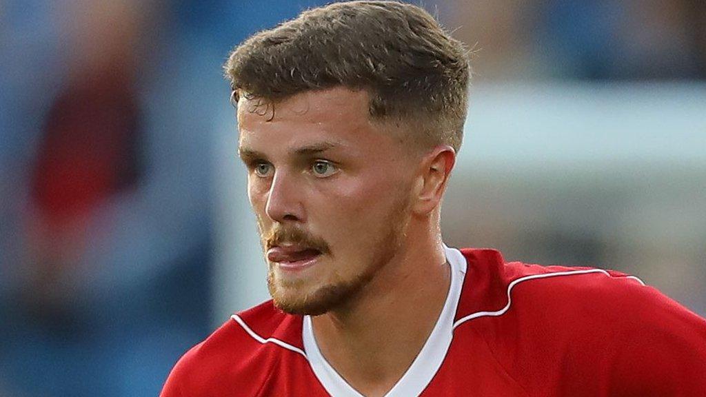 Adam McDonnell in action for Aldershot Town