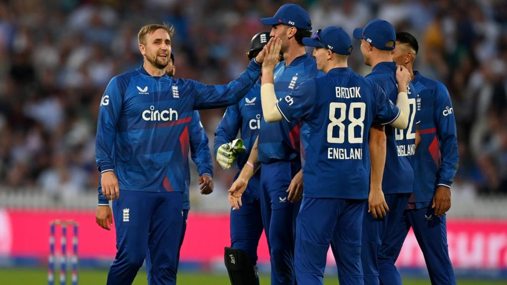 Liam Livingstone celebrates the wicket of Glenn Phillips