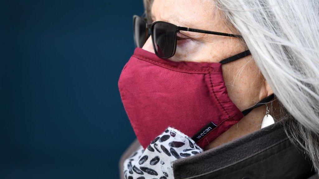 Woman wearing surgical mask