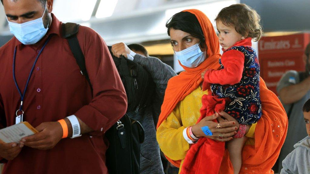 Afghan refugees arrive at Dulles airport