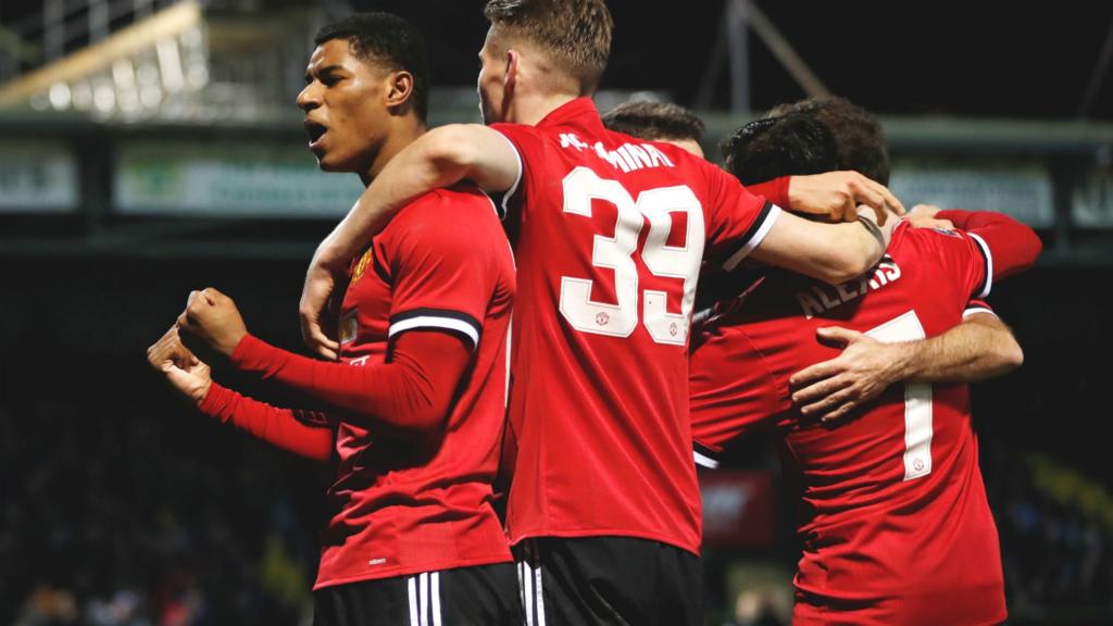 Manchester United celebrate their second goal