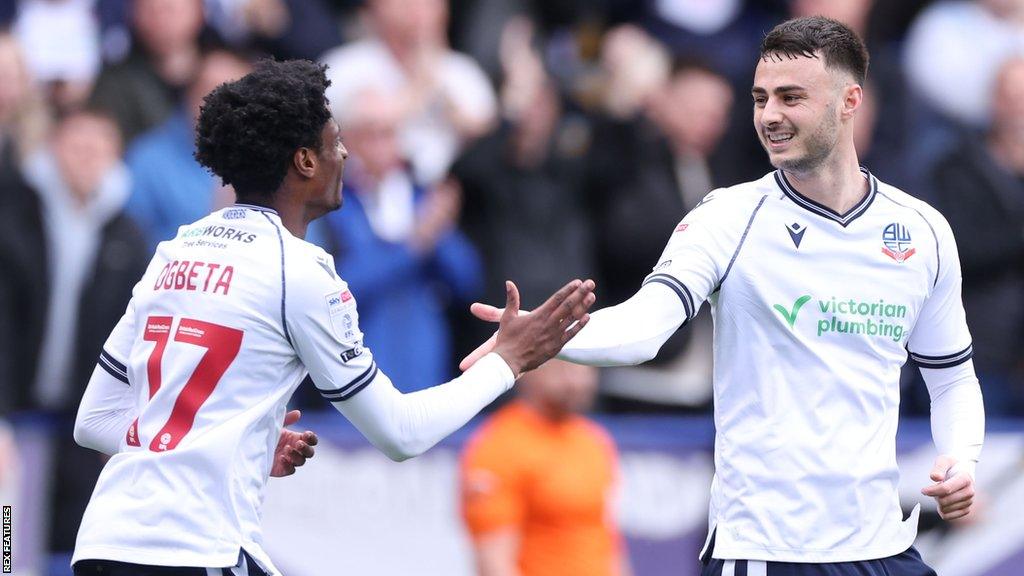 Aaron Collins celebrates equalising against Portsmouth