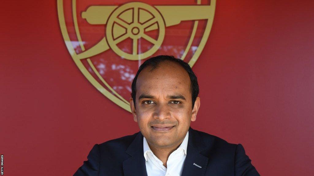 Arsenal chief executive Vinai Venkatesham with the club crest