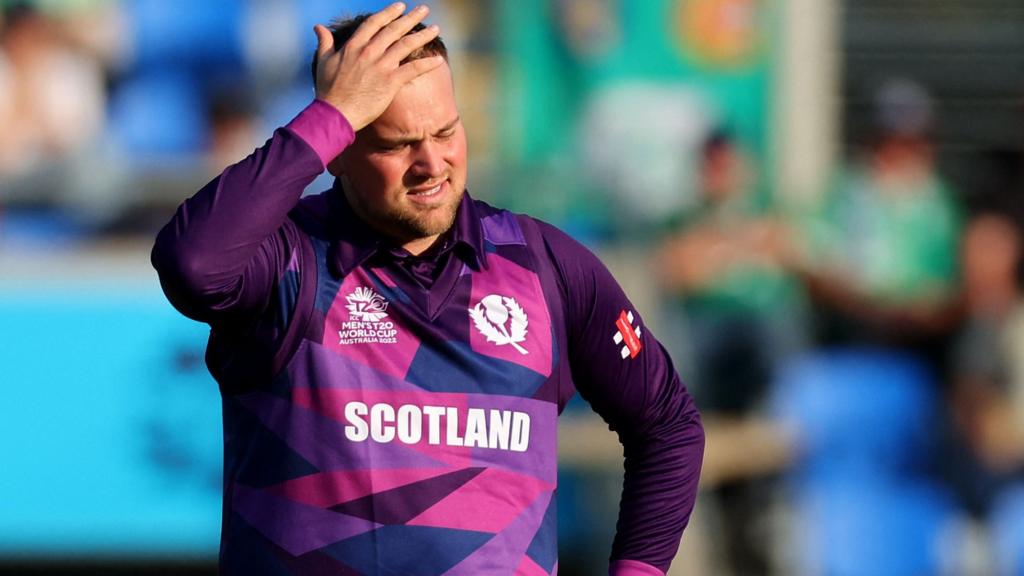 Scotland bowler Mark Watt puts his hand on his head