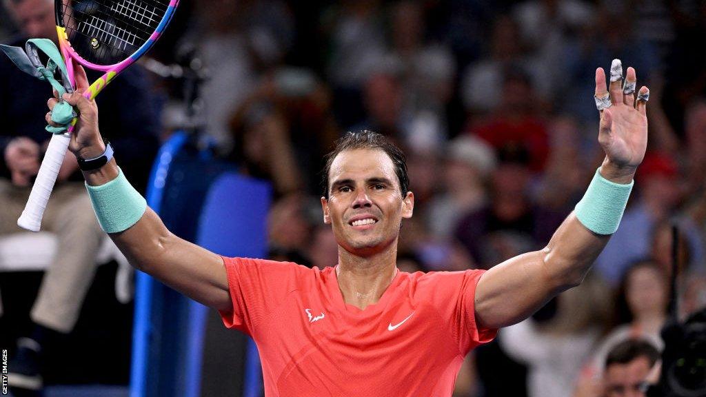 Rafael Nadal celebrates after beating Dominic Thiem at the Brisbane International