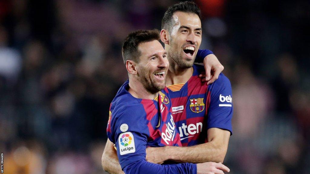 Lionel Messi and Sergio Busquets in 2019