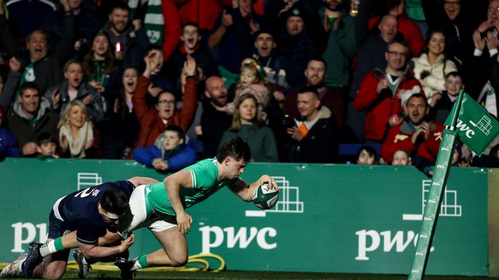 Hugo McLaughlin scores a try for Ireland