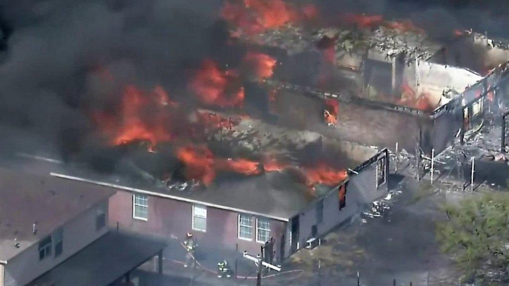 Burning buildings in Texas