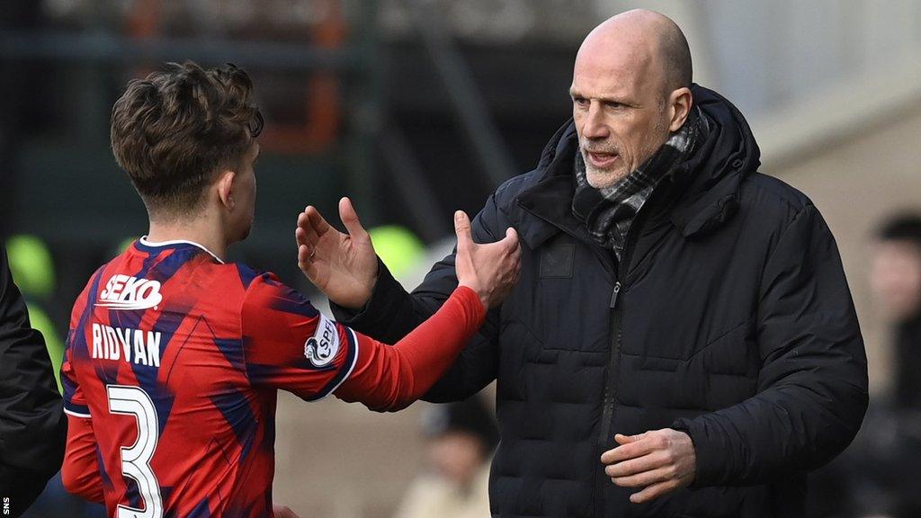 Rangers left-back Ridvan Yilmas and manager Philippe Clement