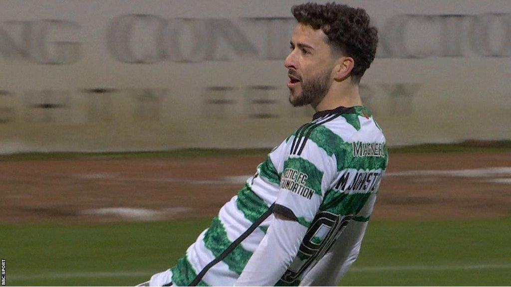 Mikey Johnston celebrates after scoring for Celtic against Dundee on Boxing Day