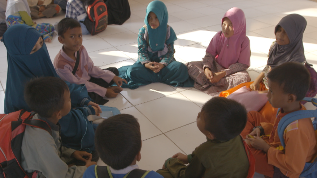 Lulu, far left, with her schoolchildren