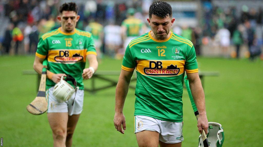 Dunloy brothers Nigel and Seaan Elliott show their disappointment after the Croke Park contest