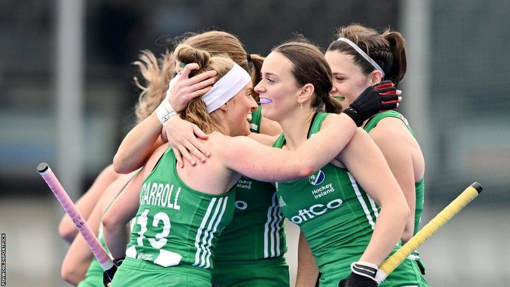 Ireland players celebrate a goal against Italy