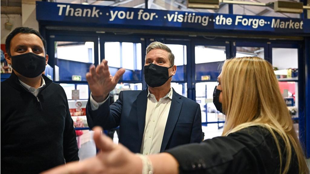 Labour Party leader, Sir Keir Starmer and the leader of Scottish Labour, Anas Sarwar visit the Forge Market on 28 January 2022 in Glasgow, Scotland