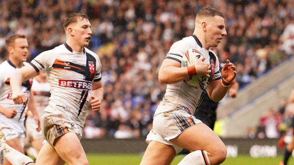 England captain George Williams goes in for a try against France