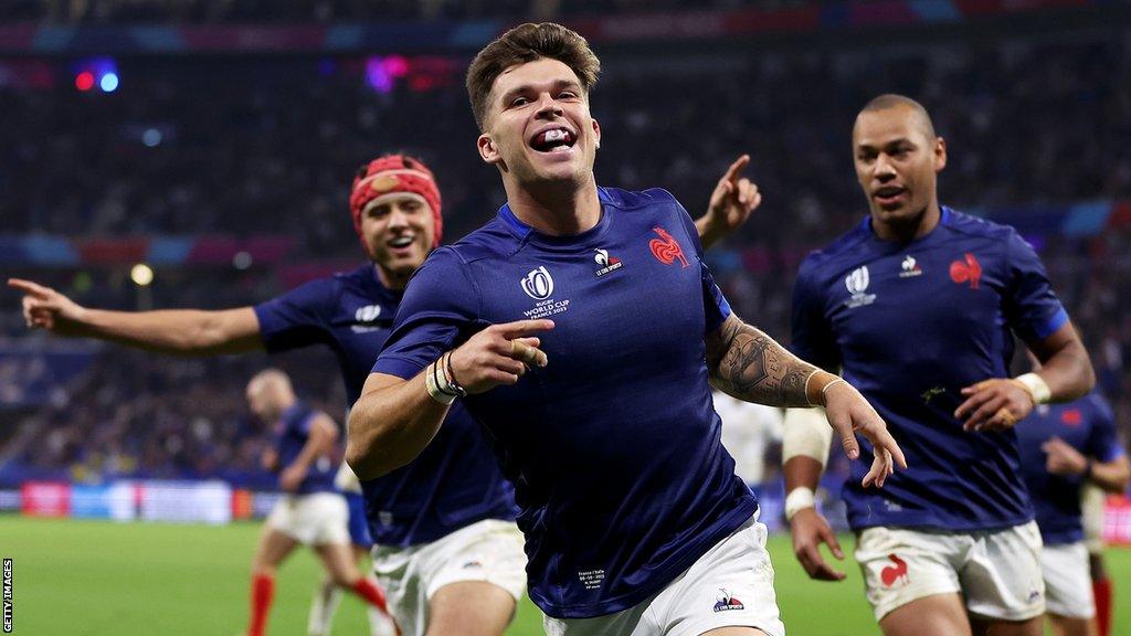 Matthieu Jalibert celebrates scoring France's fifth try