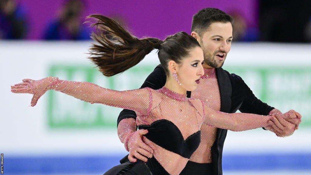 Lilah Fear and Lewis Gibson ice skating in Lithuania