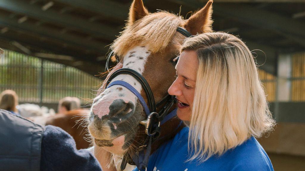 Horse and trainer