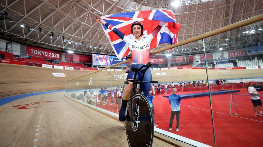 Sarah Storey celebrates on her bike at Tokyo 2020