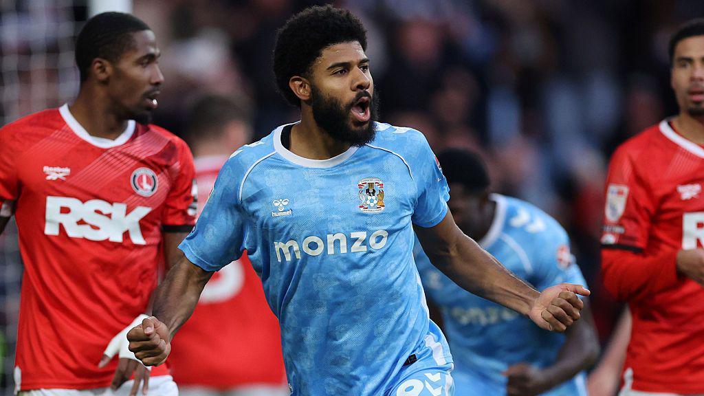 Ellis Simms celebrates scoring against Charlton Athletic