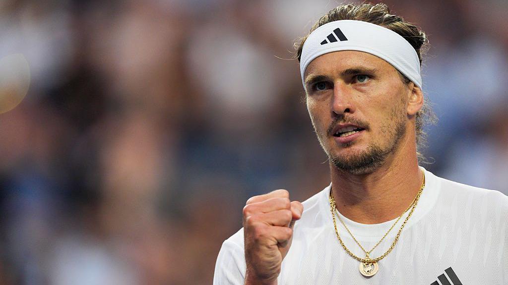 Alexander Zverev clenches his right fist in celebration