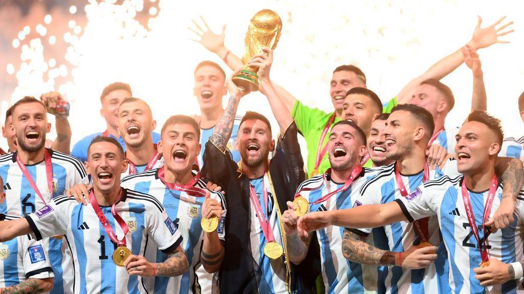 Argentina lifting the trophy in 2022.