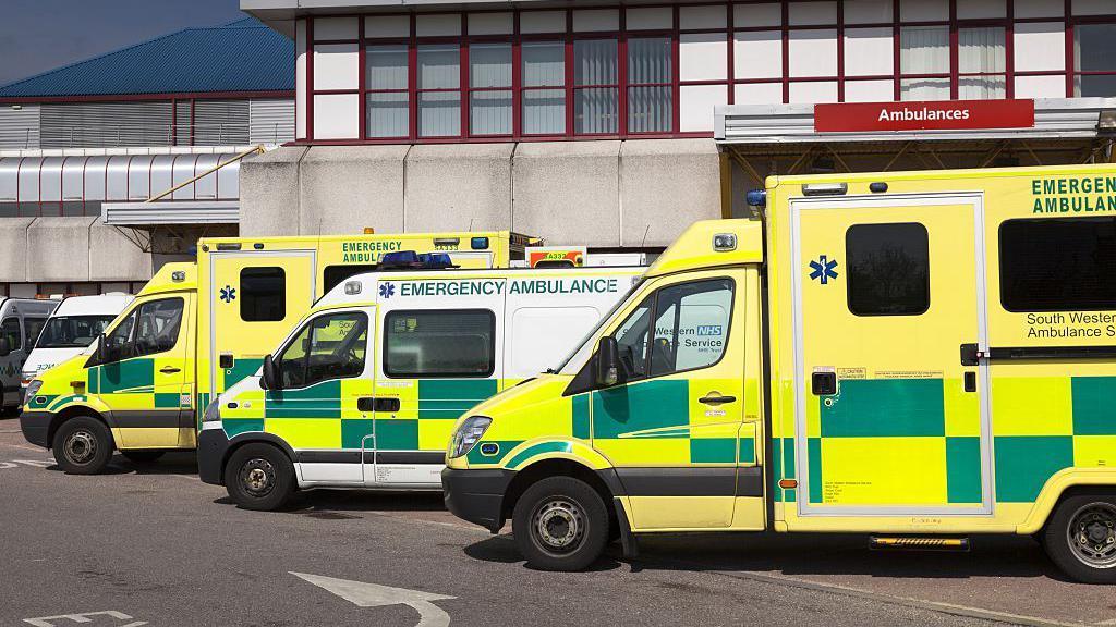 Three ambulances parked in a row outside Royal Bournemouth Hospital