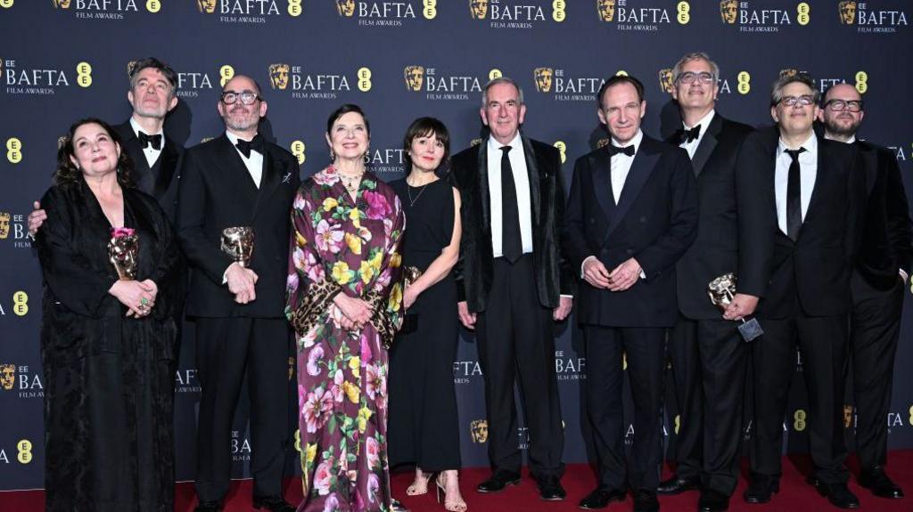 A picture of the cast and crew (and Robert Harris) of Conclave, in front of the hoardings at the Royal Festival Hall in London on Sunday.