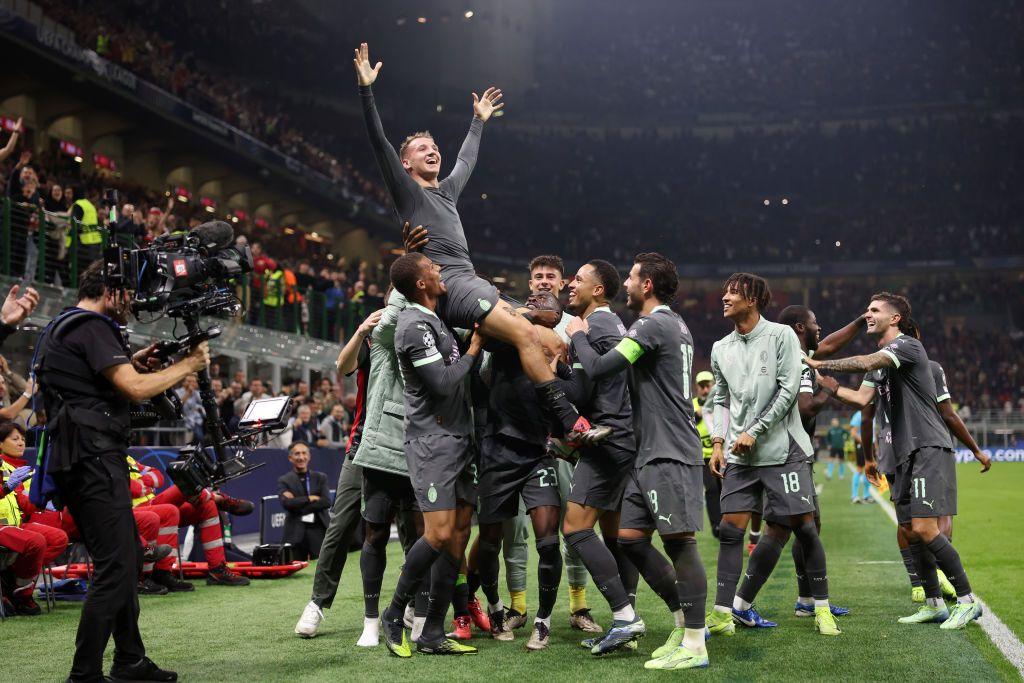 Camarda lifted up by AC Milan team-mates