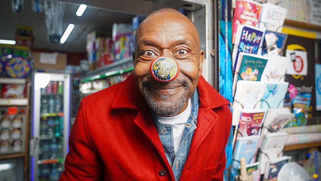 Sir Lenny Henry wearing a red nose for Comic Relief.