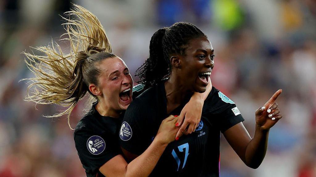 Michelle Agyemang celebrates scoring against Italy with England team-mate Ella Toone