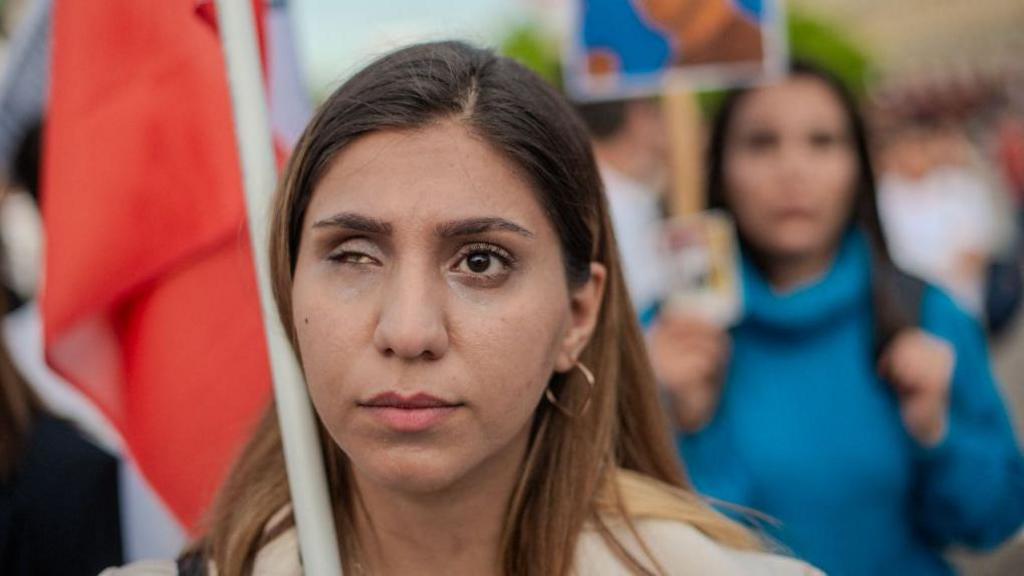 Kosar Eftekhari at a Woman Life Freedom protest in Berlin, Germany.