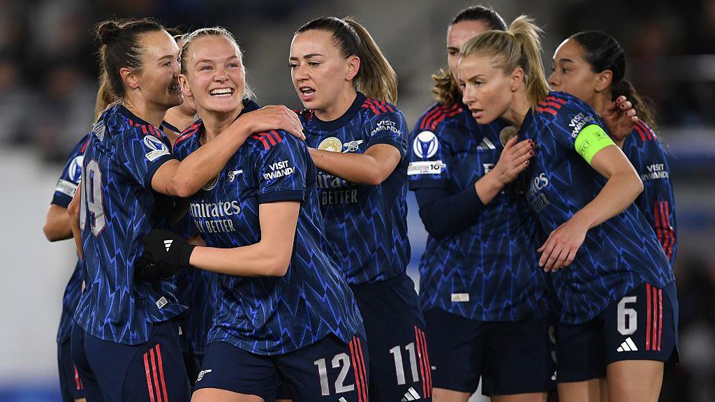 Arsenal players celebrate during their4-0 win at OH Leuven