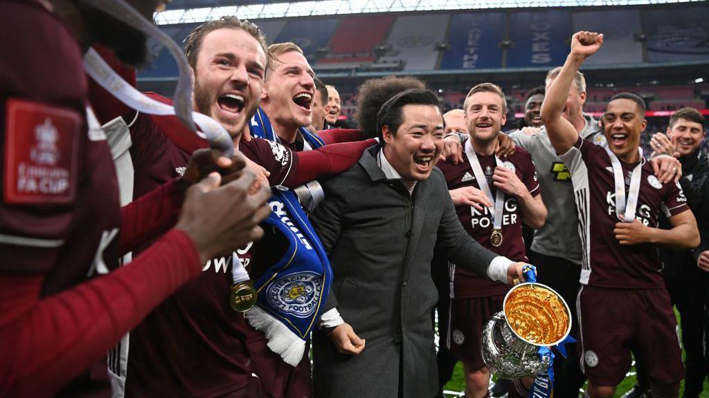  Khun Top, Chairman of Leicester City celebrates with the Emirates FA Cup trophy following The Emirates FA Cup Final match between Chelsea and Leicester City at Wembley Stadium on May 15, 2021