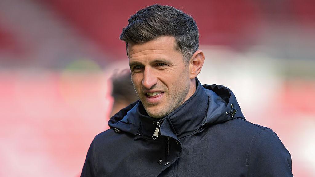 A smiling Portsmouth boss John Mousinho