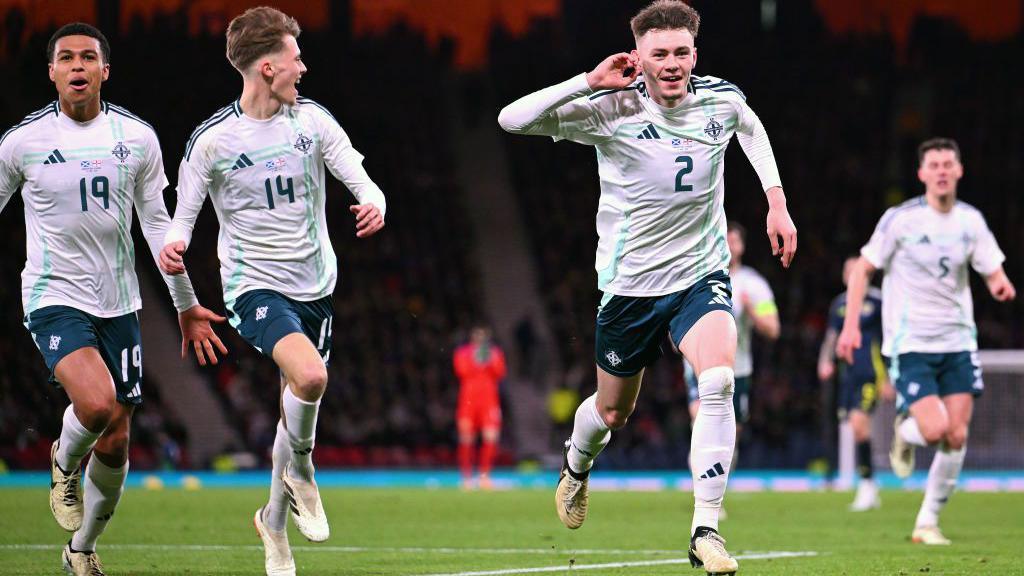 Conor Bradley celebrates scoring against Scotland in a friendly win in 2024