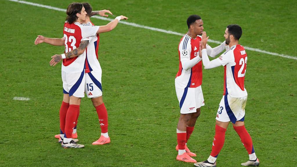 Riccardo Calafiori, Jakub Kiwior, Gabriel and Mikel Merino of Arsenal celebrate at full-time