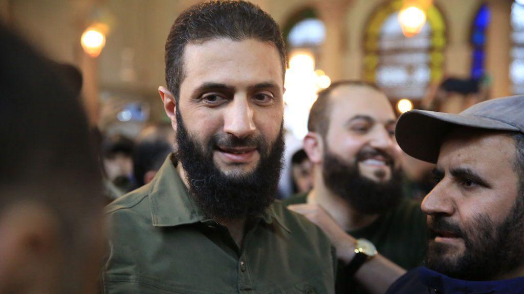 Abu Mohammed al-Jolani addressing crowds in a mosque in Damascus