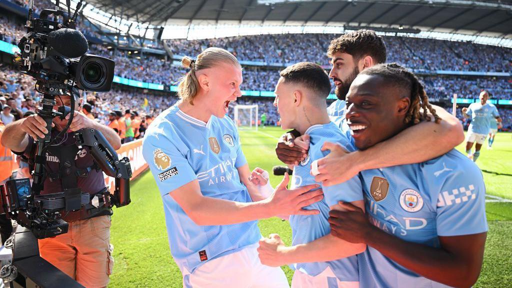 Manchester City celebrate scoring a goal