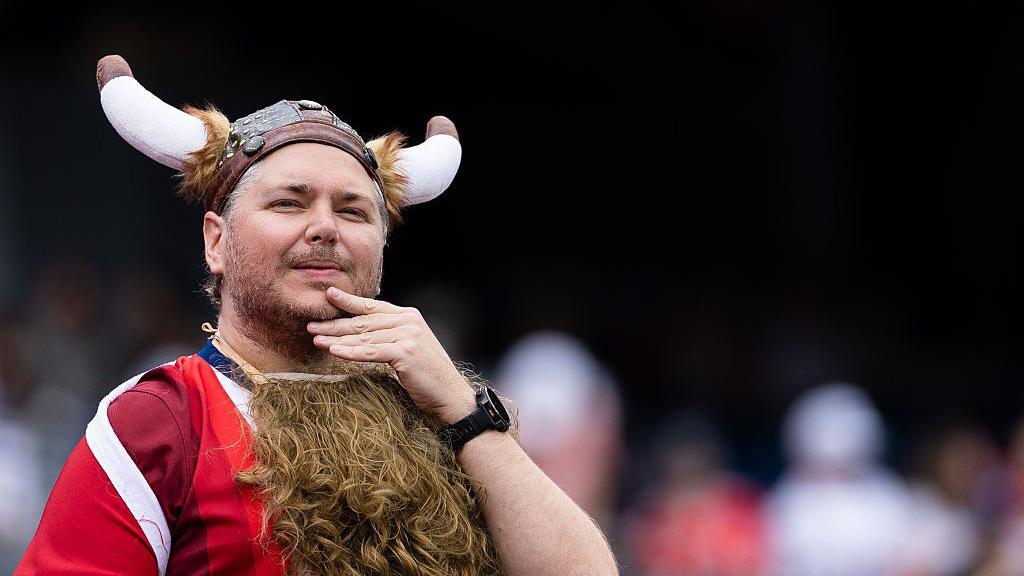 A Norwegian fan wearing a fancy dress viking helmet during the FIFA World Cup 2026 Group I match between Norway and France.