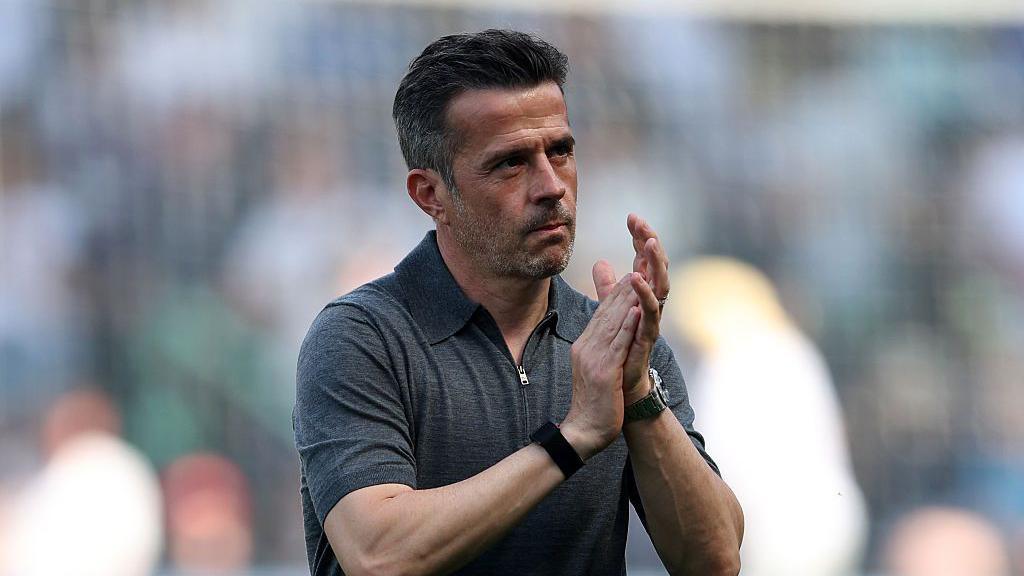 Marco Silva applauds the fans