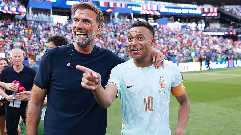 Jurgen Klopp and Kylian Mbappe