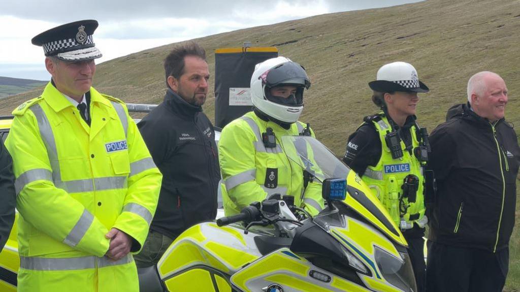 Police officers lined up