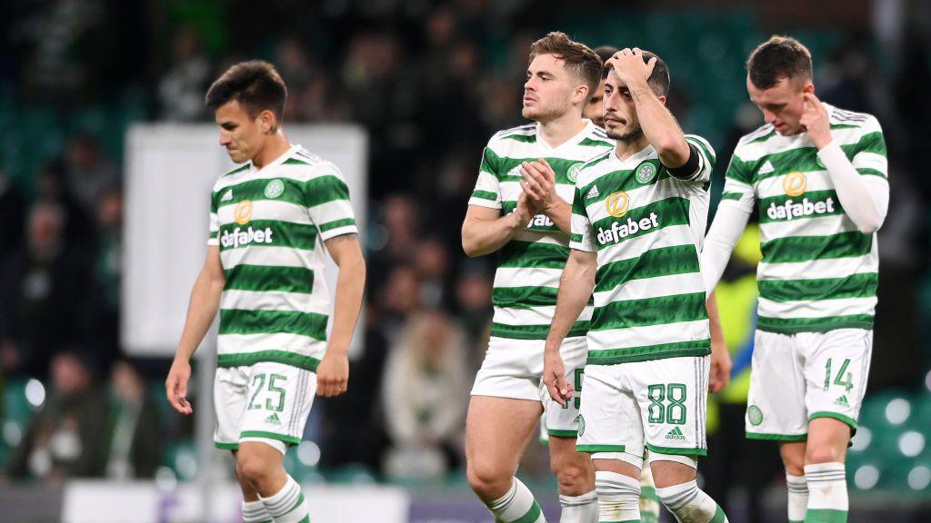 Celtic players look dejected following their defeat in the Champions League group match in 2022