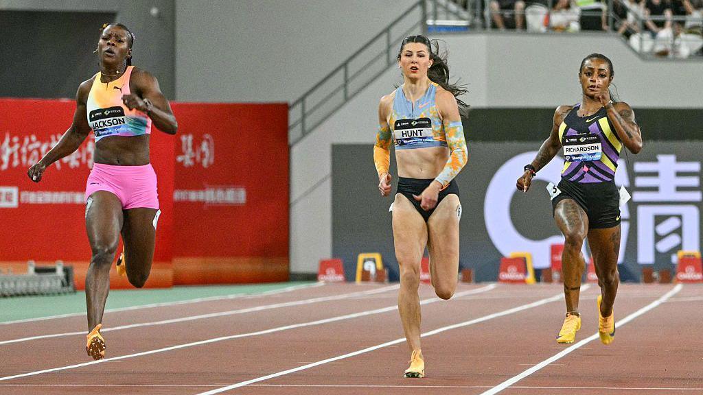 Jamaica's Shericka Jackson, Britain's Amy Hunt, and USA's Sha'Carri Richardson compete in the women's 200m.